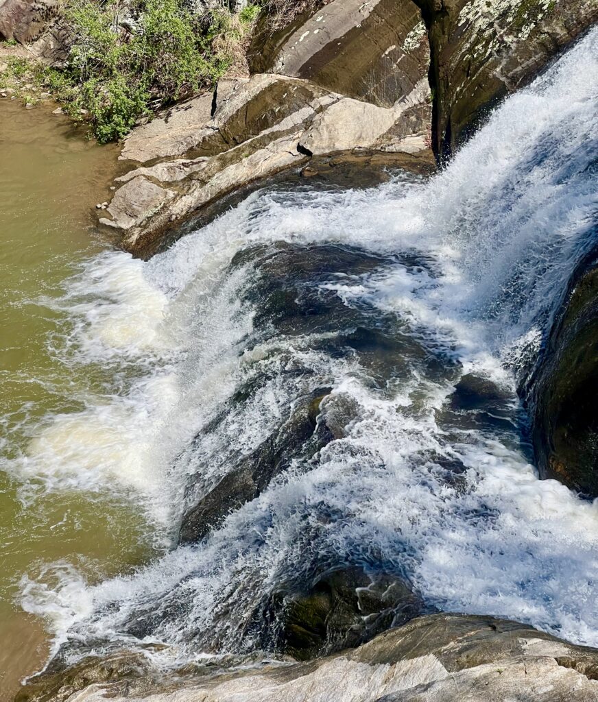 close up of the bottom portion of mcgalliard falls waterfall in valdese nc
